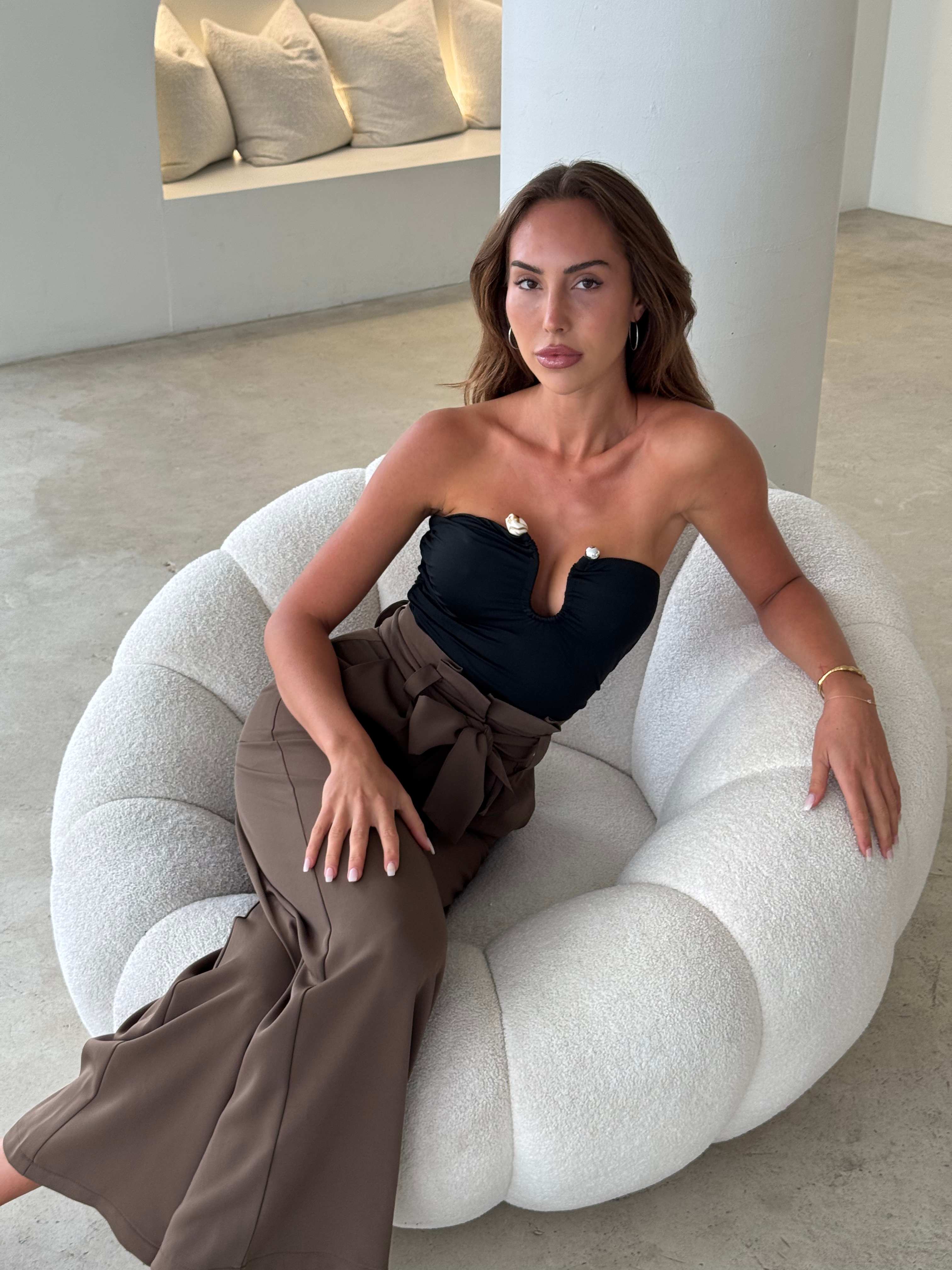 Elegant Strapless Top With High-Waisted Trousers